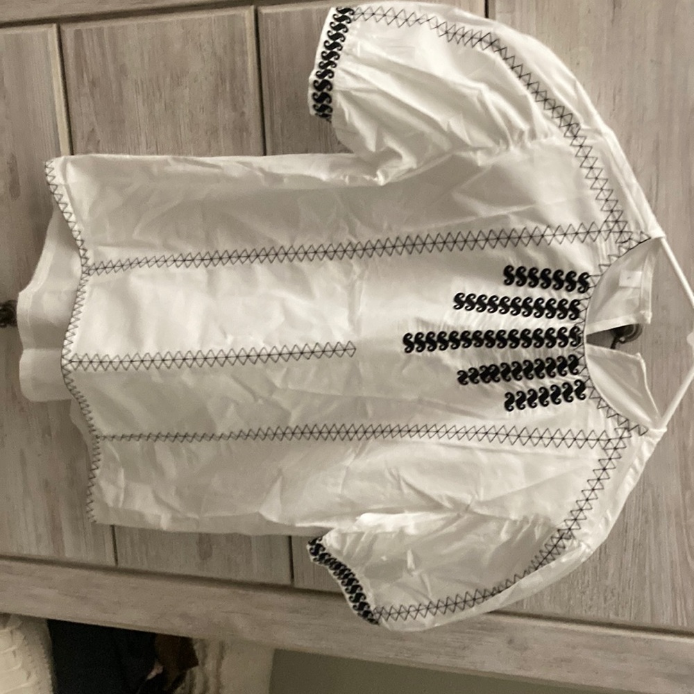 White stitched blouse